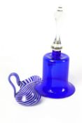 A Victorian blue glass bell with clear handle,