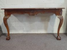 A George III style mahogany console table,