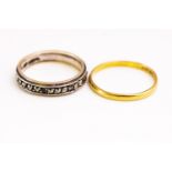 A hallmarked 22ct gold 2mm wedding ring; A marcasite set full eternity ring. Both size N.