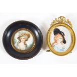 A hand painted miniature of a Gainsborough style lady contained in an oval gilt brass frame,