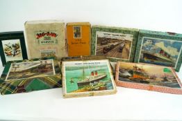 A collection of wooden jigsaw puzzles, to include various 'Victory' puzzles,