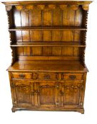 An oak dresser in George III style,