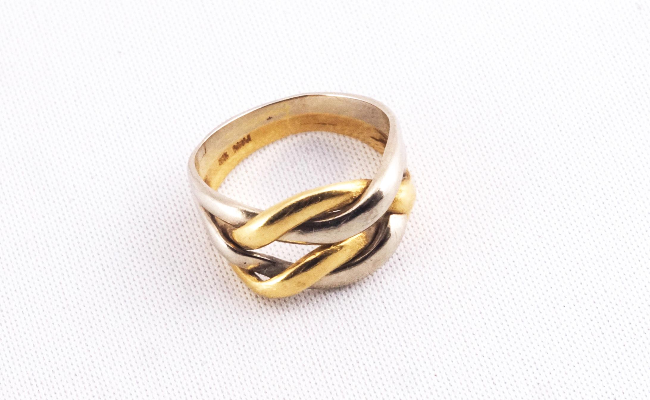 A yellow and white metal puzzle style dress ring. No hallmark - stamped 18K Italy for 18ct gold. - Image 2 of 2