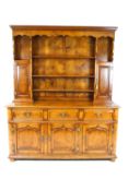 An oak dresser in George III style,