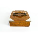 An Edwardian oak humidor, silver mounted cigar box, of rectangular section,