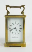 A brass carriage clock, the enamelled dial inscribed 'Bruford & Sons/Eastborne + Exeter',