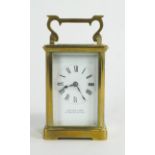 A brass carriage clock, the enamelled dial inscribed 'Bruford & Sons/Eastborne + Exeter',