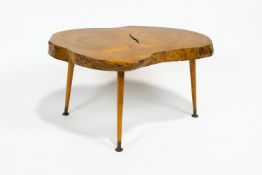 A specimen wood side table, the top being a large section of a bifurcated trunk,