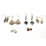 A collection of six pairs of earrings of variable designs. Most are marked for sterling silver 925.