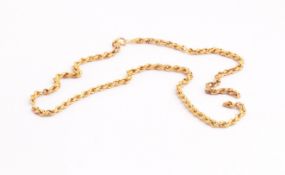 A yellow metal hollow rope chain with bolt ring clasp - chain broken into two pieces.