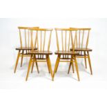 Four Ercol beech and elm stick back chairs, circa 1960,