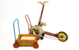 A Triang 'Baby Walker', mid 20th century, the push along trolley with modern wooden blocks,