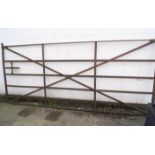 An iron six bar gate 123cm x 282cm