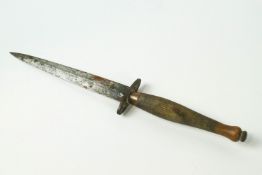 A Commando dagger, with weighted copper handle,