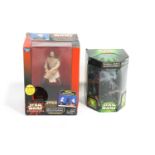 Two boxed Star Wars collectors pieces being a think way Qui-Gon Jinn interactive talking bank,