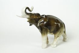 A Royal Dux model of an elephant, 20th century, applied pink triangle, printed and impressed marks,