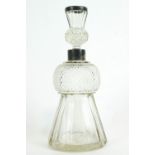 A silver mounted glass thistle shaped decanter and stopper, with panel and diamond cutting,