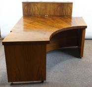 A late 20th/early 21st century walnut veneered corner desk by Ben Brooks,