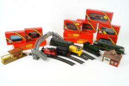 A Hornby model railway, to include: GWR locomotive, tank locomotive, assorted trains and carriages,