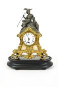 A Continental gilt metal mantle clock on embossed wood stand,