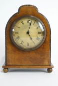 A Swiss (Buren) eight day mantel clock, the metal dial with Roman numerals,