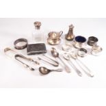 A pair of Old English pattern silver tongs, London 1803, 14cm long, with a selection of other items,