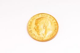 A half sovereign coin dated 1913.