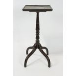 A 19th century hardwood kettle stand, the square top with cared bead border on turned pedestal,