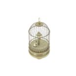 An unusual bird in cage clock, in the form of a 19th century Swiss Automaton,