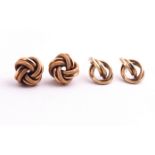 A collection of two pair of knot earrings, both individually marked for 9ct gold.