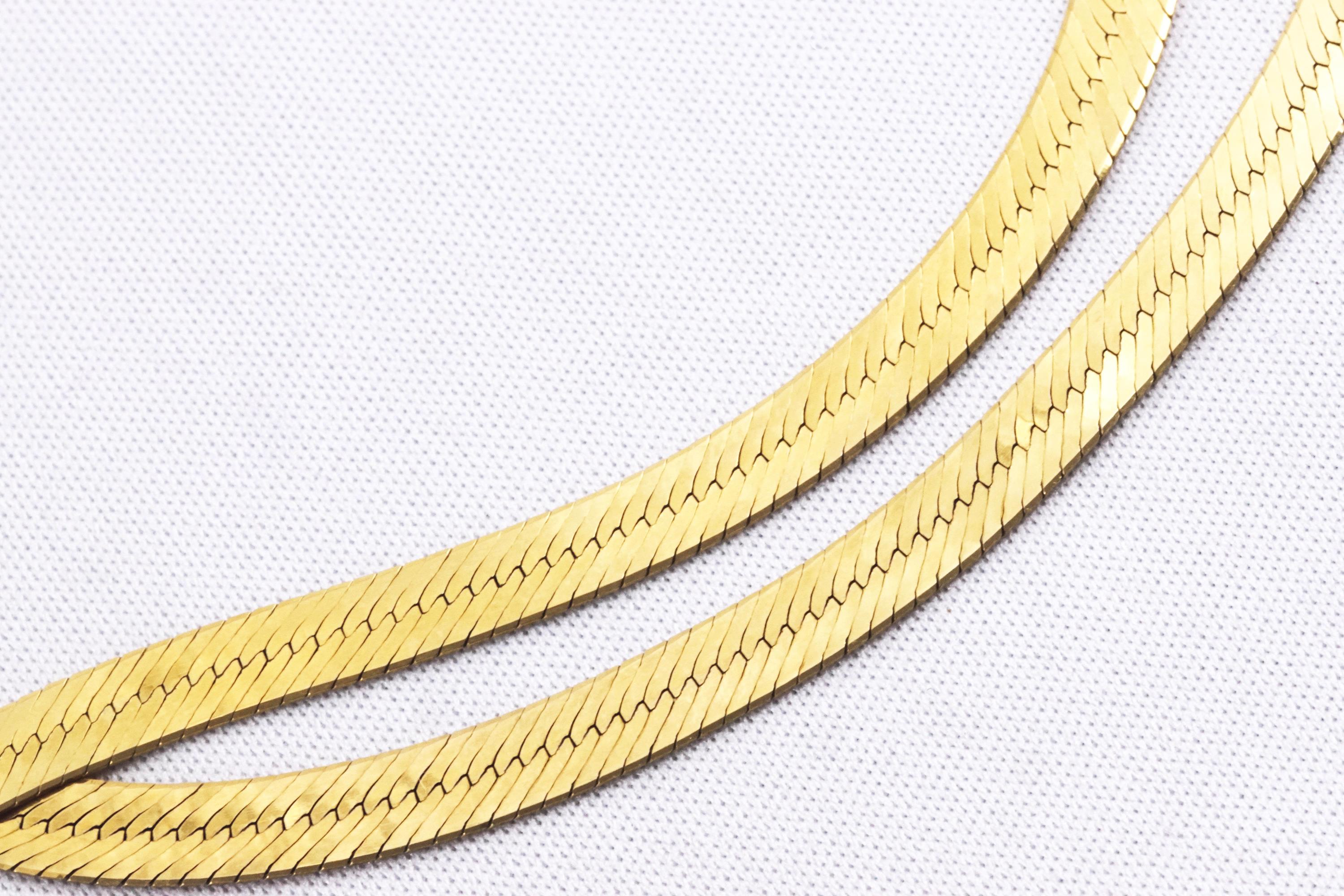 A hallmarked 9ct gold flat link collar necklace; A 9ct gold (stamped) pair of hoop earrings. - Image 2 of 2