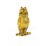 A brass owl vesta case, with hinged head,