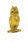 A brass owl vesta case, with hinged head,