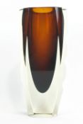 An Art glass vase, of tapering form, the thick walled vessel with amber tear shaped interior,