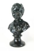 A black painted plaster bust in 19th century style of a young boy on flared socle,