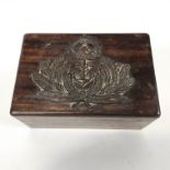 A carved wood military box containing a collection of brass and gilt metal naval and RAF buttons