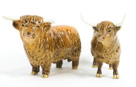 Two Beswick pottery models of Highland cattle, 20th century, printed black marks,