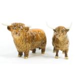 Two Beswick pottery models of Highland cattle, 20th century, printed black marks,