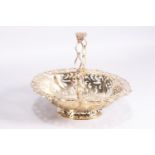 A small silver gilt sweetmeat basket of oval form with pierced panel body