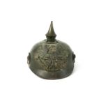 A 1st WW German Prussian brass Pickelhaube helmet, or traditional form,