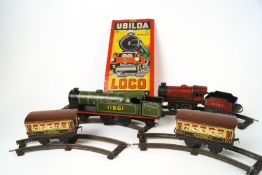 An Ubilda vintage train set, comprising a locomotive , carriages and track,