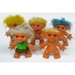 Five vintage Dam Things large trolls, marked C.DAM THINGS/EST.1964,two wearing felt clothing,