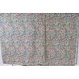 Three William Morris style curtains, lined with red flowers and blue leaves and branches,