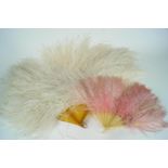 A white ostrich feather fan on faux blond tortoiseshell sticks and guards, 68cm long,