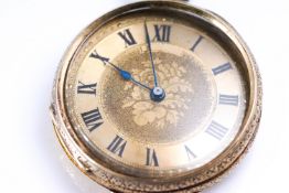 A gold engraved cased open face pocket watch, key wound movement, case stamped 18K.