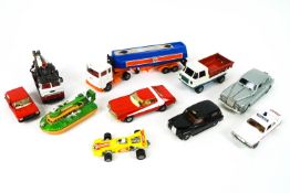 A collection of toy and model cars, to include a Corgi Mercedes 190, a Holmes Wrecker,