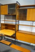 A Staples Ladderax modular wall unit, designed by Robert Heal, comprising : two cupboards,