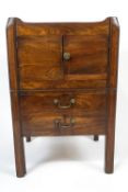 A 19th century mahogany pot cupboard of rectangular form,