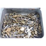 A collection of approximately sixty, various pocket watch keys