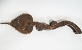 A carved set of wooden bellows, perhaps Chinese,